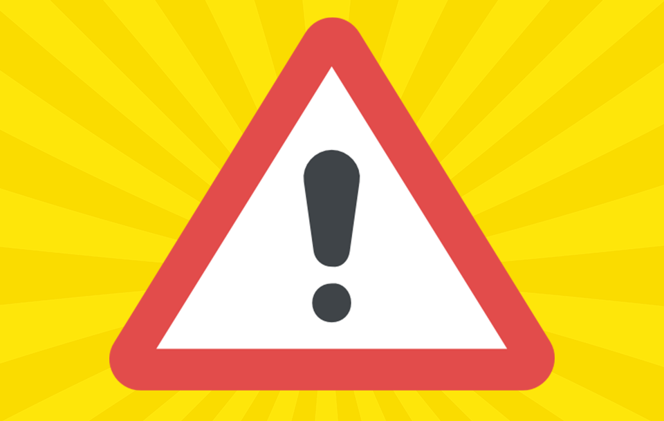 Įspėjamasis kelio ženklas – raudonu apvadu apibrėžtas geltonas trikampis su juodu šauktuku viduryje ir spinduliuojančiomis linijomis fone.